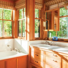 Master bathroom in home on Littlejohn Island, ME featuring Thassos marble on the vanity top, floor tile and tub surround