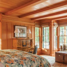 Arts and crafts style master bedroom in home on Littlejohn Island, ME featuring floral Pine Cone Hill duvet cover from Dwellings in Falmouth
