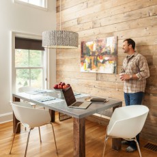 When building his own home, Geoff Bowley of Bowley Builders took inspiration from farmhouses and barns. In the dining area, a reclaimed wood accent wall provides warmth