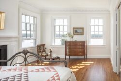 bedroom with multiple windows