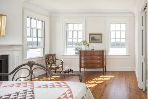 bedroom with multiple windows