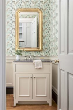 powder room and mirror above