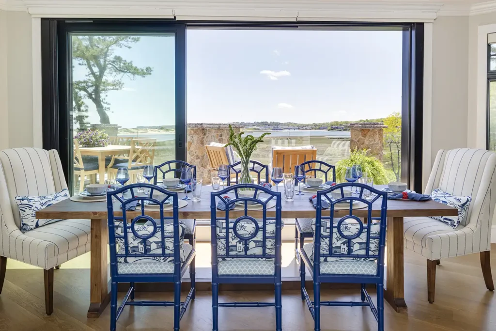 Across from the kitchen is the dining area, which was outfitted with chairs by Villa and House in a Thibault fabric—touches of chinoiserie that repeat throughout the house.